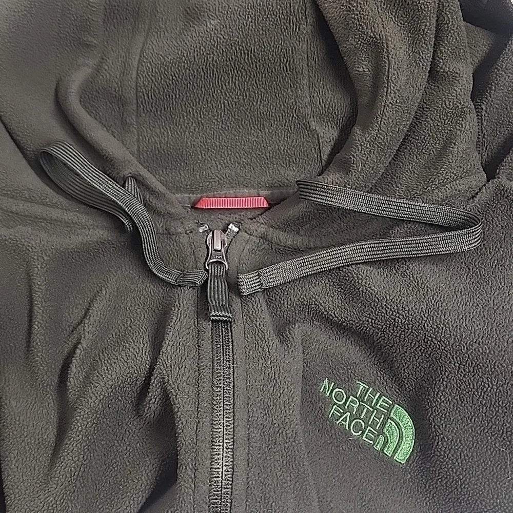 The North Face olive green embroidered  long sleeve hooded sweatshirt.